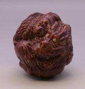A ball decorated with various animals. 5 cm high.