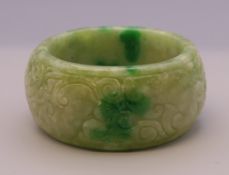 A jade napkin ring. 5 cm diameter.