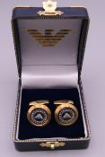 A pair of Emporio Armani cufflinks, boxed. 2 cm diameter.