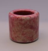 A hardstone archer's ring. 3 cm high.
