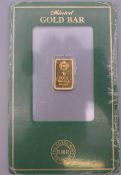 A Royal Mint 1 gram fine gold bar.