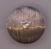 A Dutch silver pill box. 5 cm diameter. 18.9 grammes.