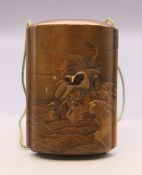 A Japanese lacquered inro. 8.5 cm high.