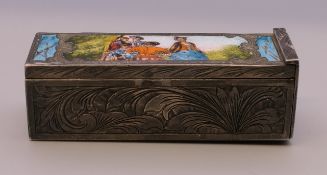 A Continental silver enamel lipstick holder. 5.5 cm long.