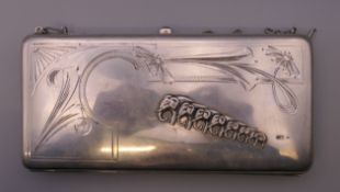 A Russian silver purse. 17 cm wide. 227.1 grammes total weight.