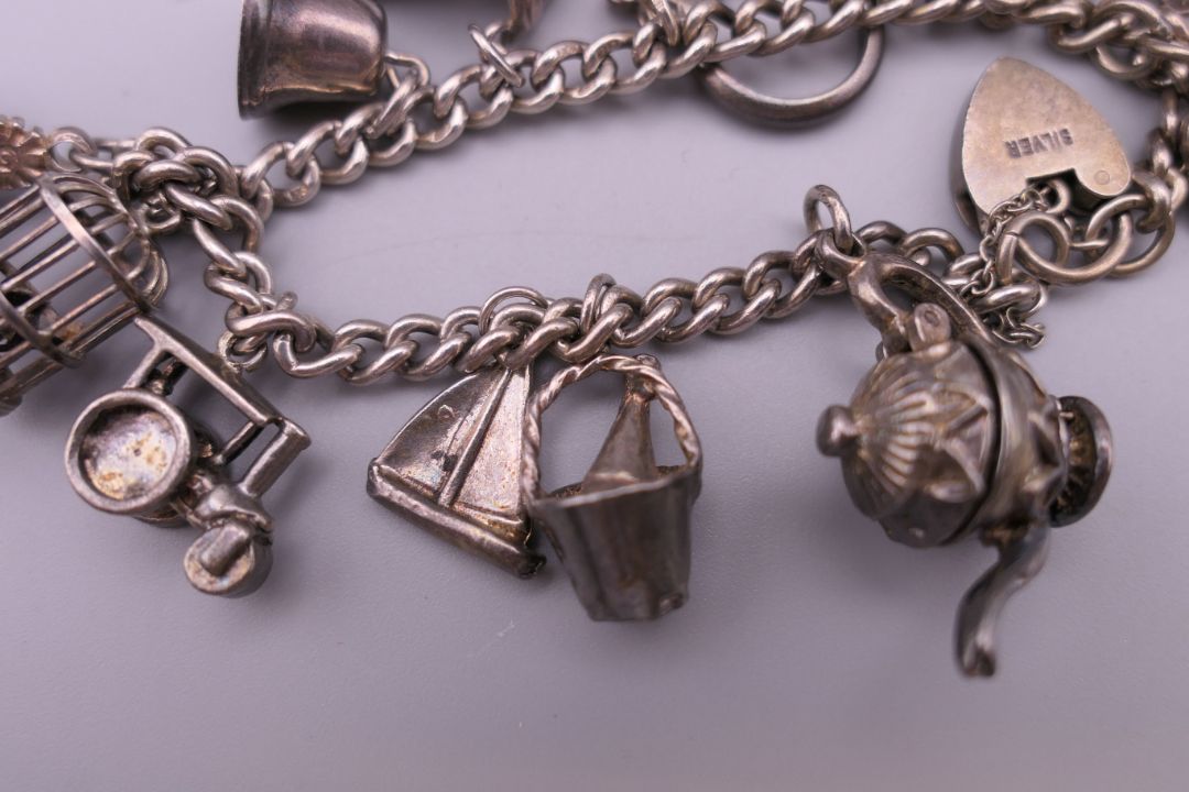 A silver charm bracelet. 39.9 grammes. - Image 3 of 5