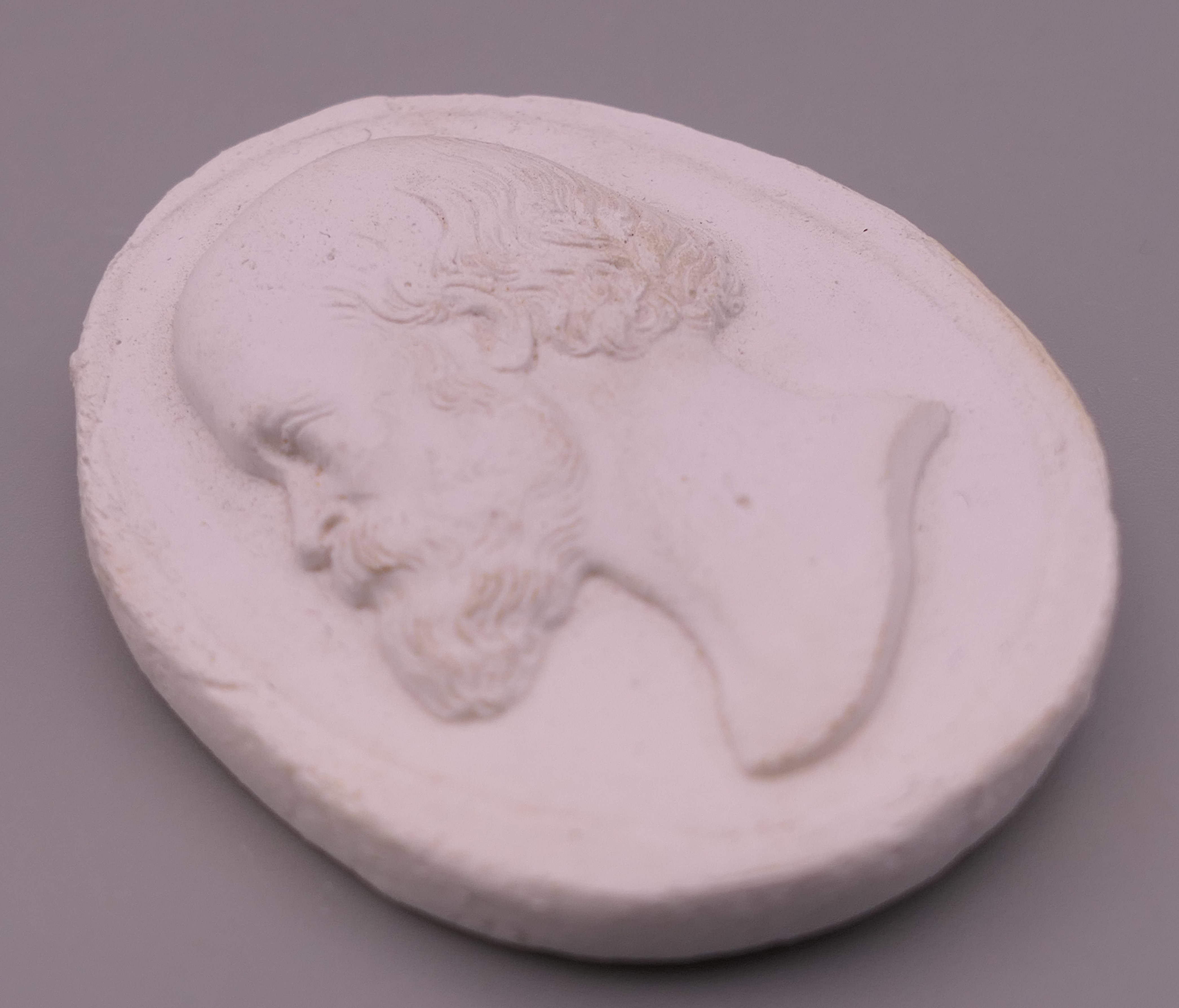 A boxed plaster intaglio depicting a bearded gentleman. 5.5 cm x 4.5 cm. - Image 4 of 5
