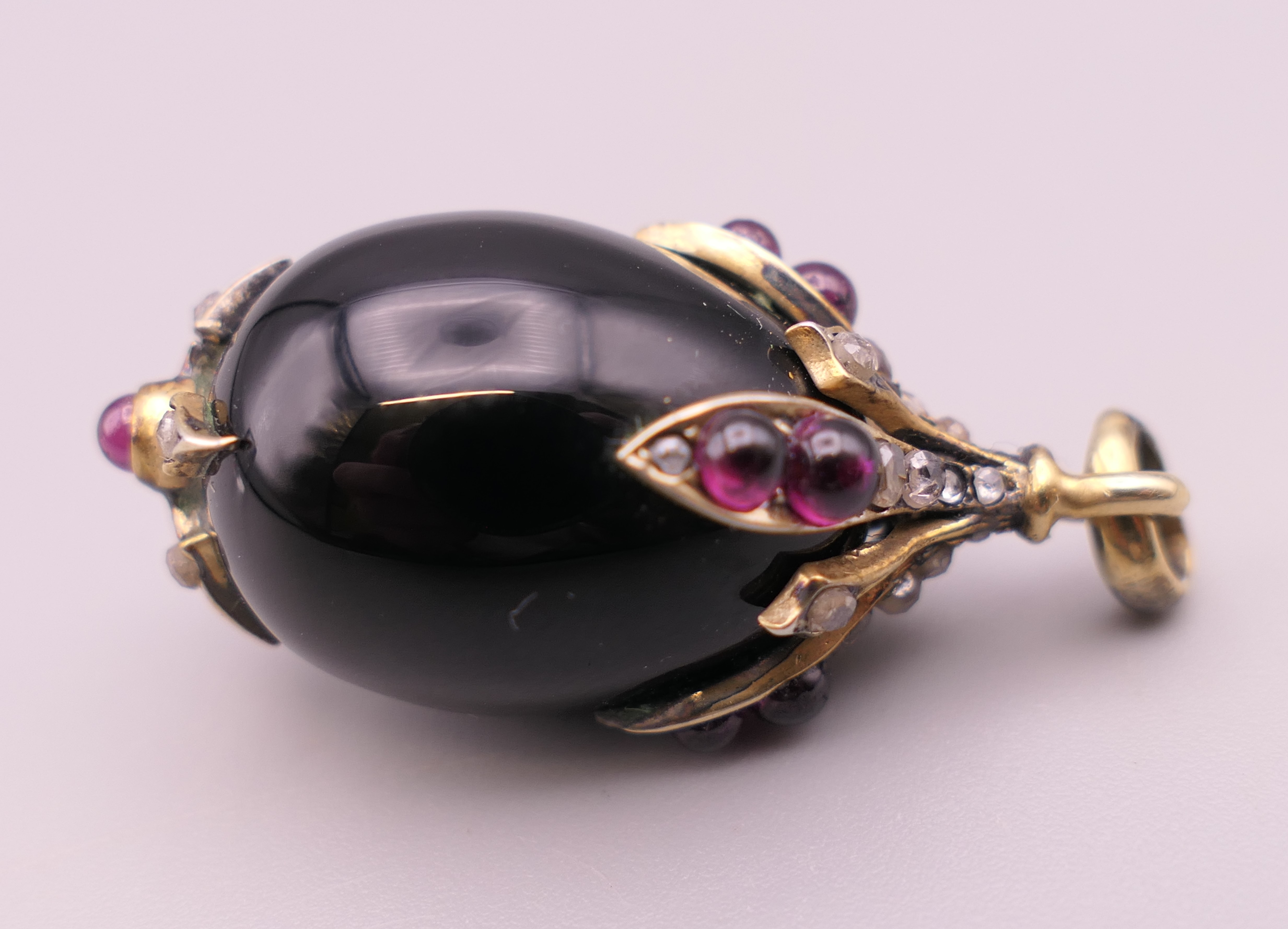 A jewelled silver mounted egg form pendant. 3 cm high. - Image 4 of 8