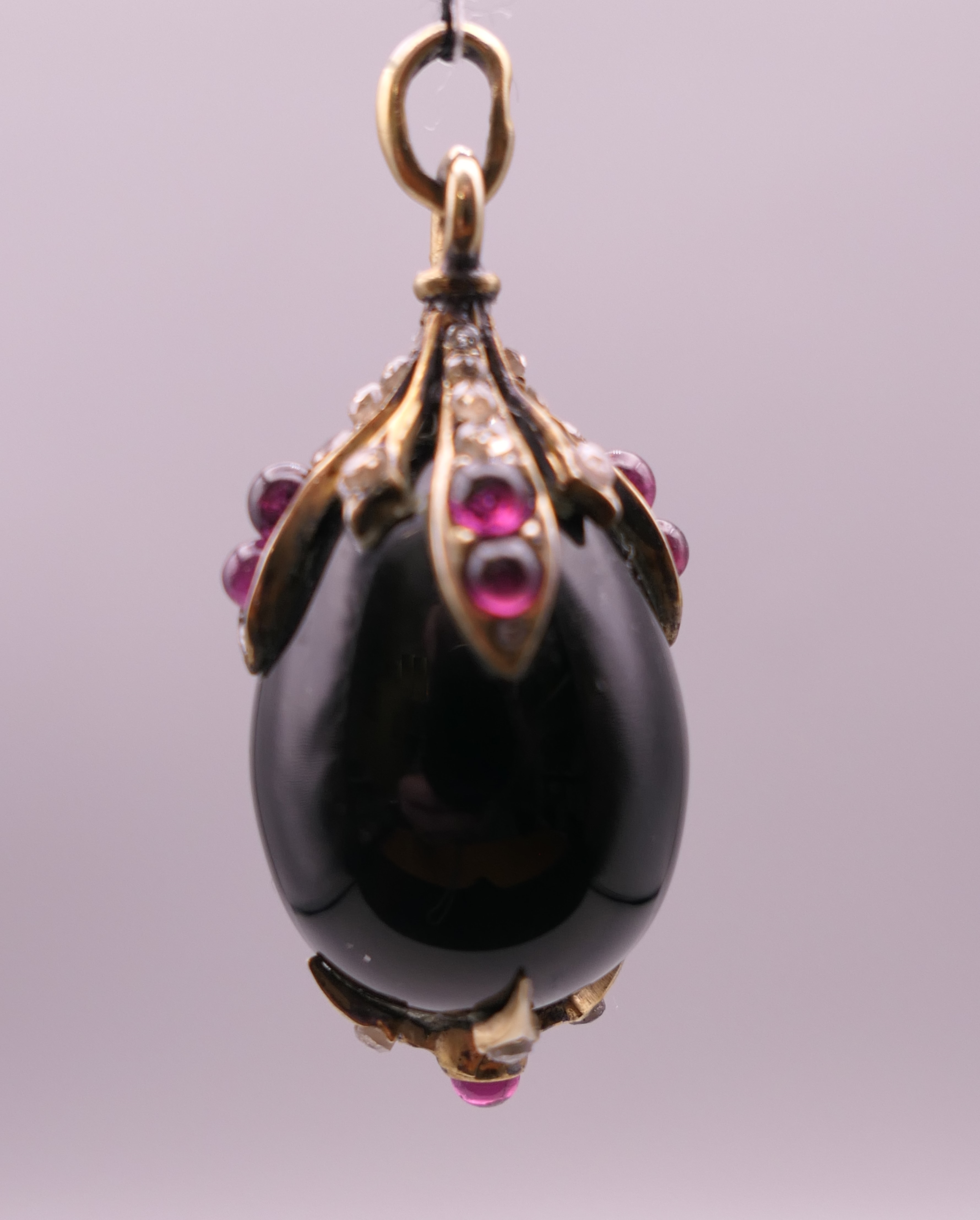 A jewelled silver mounted egg form pendant. 3 cm high. - Image 3 of 8