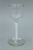 An 18th/19th century air twist stem glass. 16 cm high.