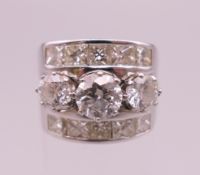 A platinum or white gold and yellow gold diamond combination ring.