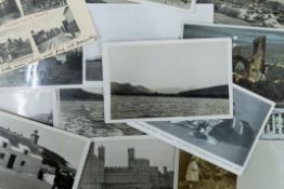 A quantity of various postcards.