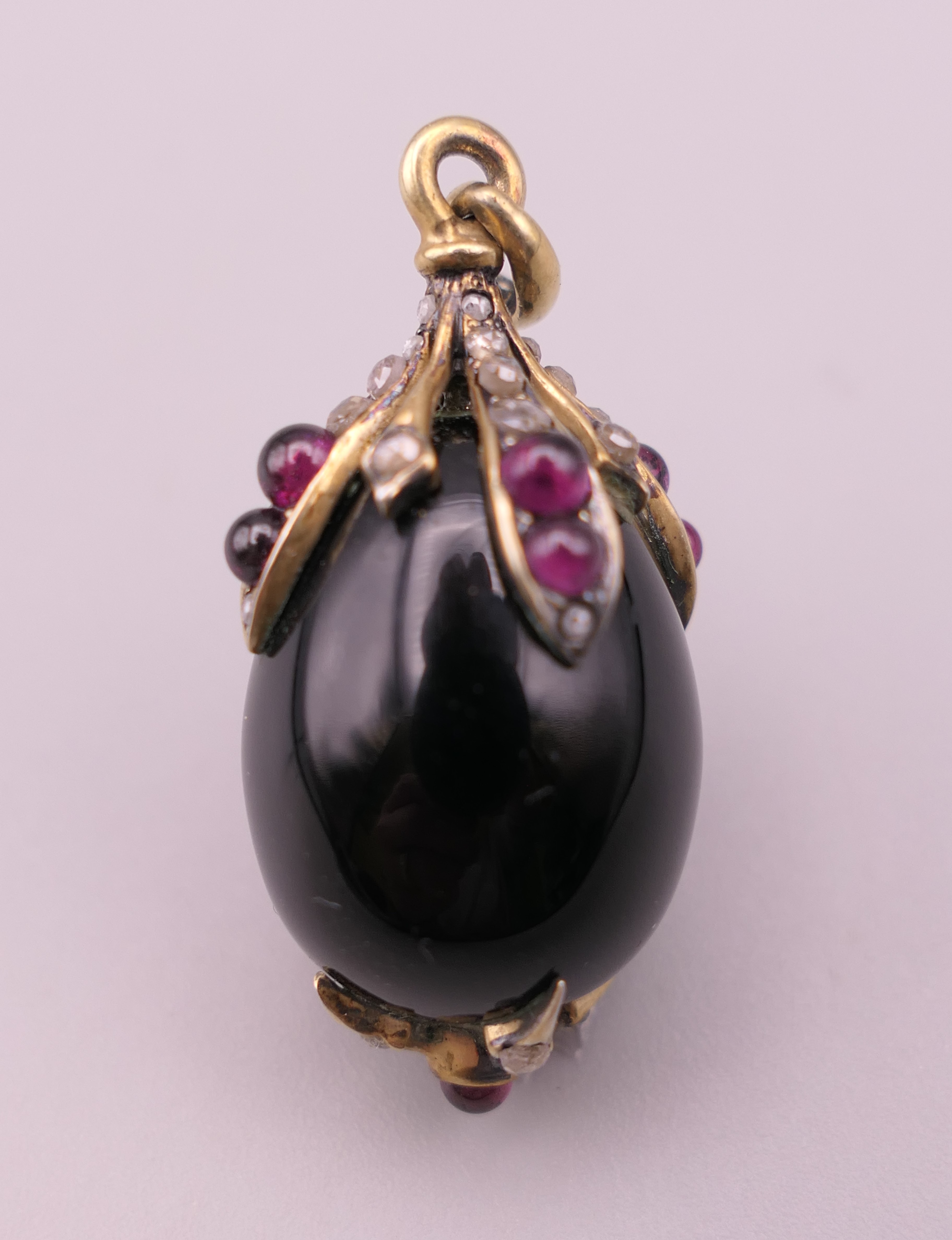 A jewelled silver mounted egg form pendant. 3 cm high. - Image 2 of 8