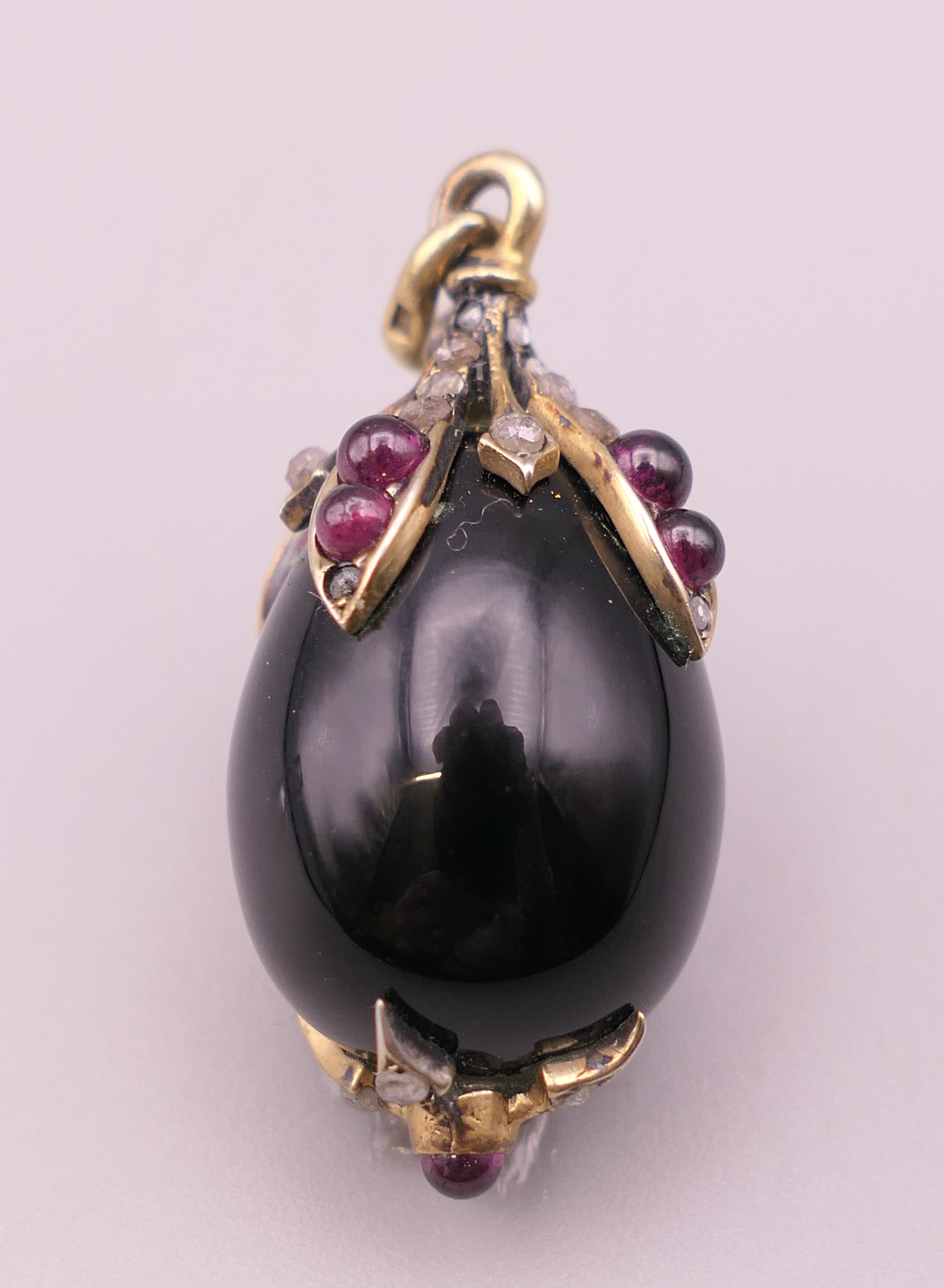 A jewelled silver mounted egg form pendant. 3 cm high. - Image 7 of 8