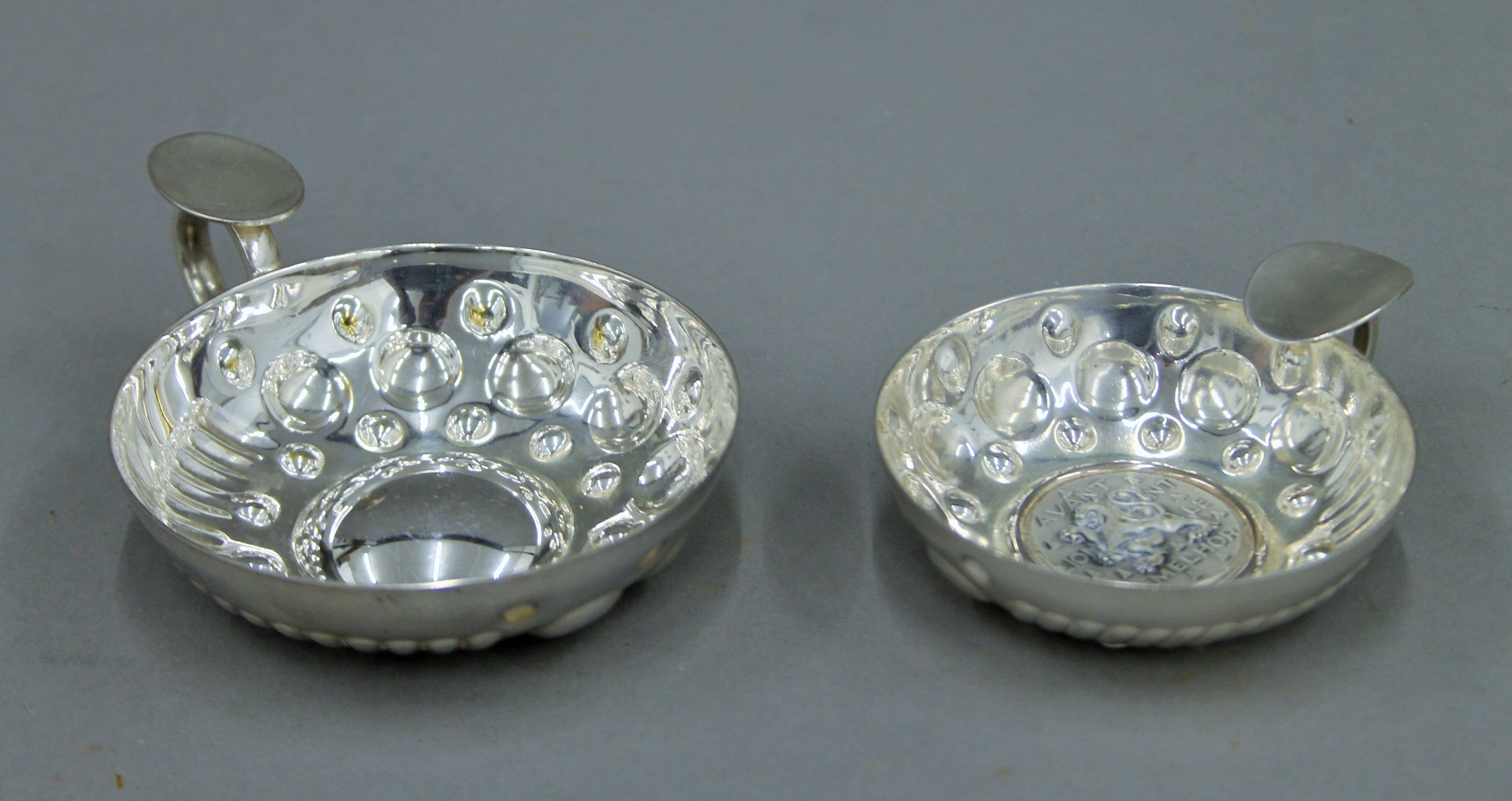 A small French silver wine taster (Augis-Lyon) and a French silver plated wine taster. The former 9.