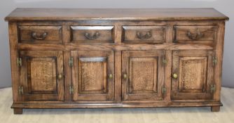 Antique style oak sideboard, fitted four drawers over four cupboards, W183 x D49 x H84cm
