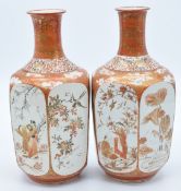 A pair of Japanese Kutani octagonal bottle vases, the panels decorated with figures, birds and