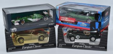 Four 1:18 scale diecast model vehicles comprising ERTL European Classics 1948 Jaguar XK120 7446