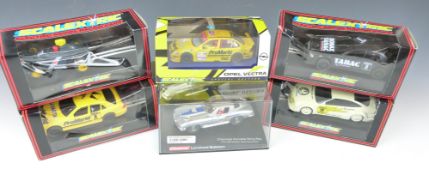Six Scalextric and Carrera 1:32 scale model motor racing cars comprising Mercedes Sonax C.601,