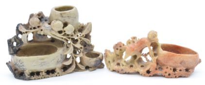 Two Chinese carved soapstone spill vases, one decorated with a monkey, L18cm