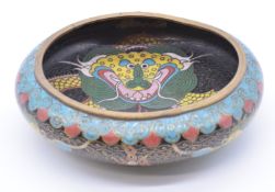 Chinese cloisonné enamel dish depicting a dragon chasing a flaming pearl, diameter 14cm