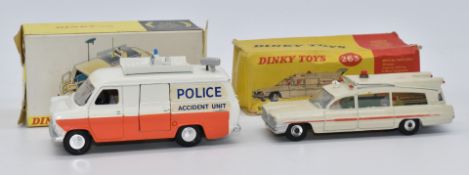 Two Dinky Toys diecast model vehicles Superior Criterion Ambulance with cream body, red stripe,