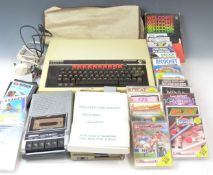 Acorn BBC Microcomputer together with various games and accessories and an Omega Cassette Recorder.