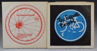 The Desperate Bicycles - Smokescreen (RR1) and The Medium Was Tedium (RR2). Records appear EX,