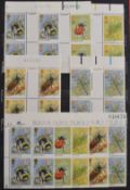 Five stockbooks of mint GB QEII stamps, singles and blocks including gutter pairs, face value