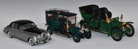 Three Franklin Mint diecast model Rolls Royce cars comprising 1907 Silver Ghost, 1955 Silver Cloud I