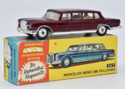 Corgi Toys diecast model Mercedes Benz 600 Pullman with maroon body, cream interior and operating