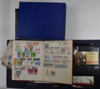 Five stockbooks and a folder containing a collection of Hong Kong mint and used stamps from QV to