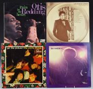 Approximately 60 albums including The Beatles, Bob Dylan, The Rolling Stones, Otis Redding, Cat