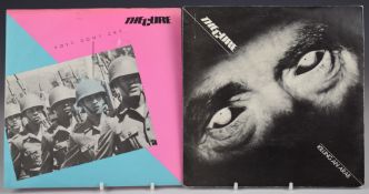 The Cure - Killing An Arab (small eleven) and Boys Don't Cry (FICS 002). Records appear EX with