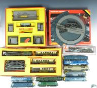 Thirteen Hornby, Tri-ang, Lima and similar 00 gauge model railway locomotives, train sets and