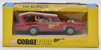 Corgi Toys diecast model The Monkees Monkeemobile with red body, white roof, yellow interior and