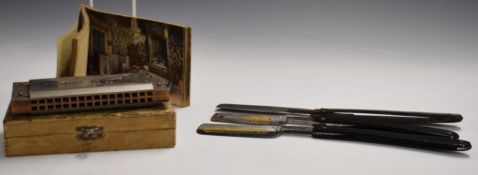 Fontainebleau le Chateau book of postcards, three cut throat razors comprising Dovo Solingen, George