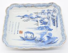 Japanese 19thC rectangular pedestal dish with gadrooned rim decorated with boat, coastline, script