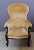 Victorian royalcore upholstered mahogany spoonback chair with carved arms and legs, raised on