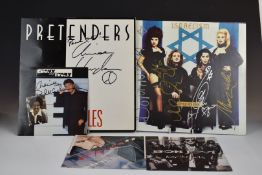The Pretenders - The Singles, signed on front cover, Army Of Lovers - Israelism, signed on cover and