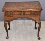 Georgian oak lowboy with crossbanded decoration, fitted three drawers and raised on cabriole legs,