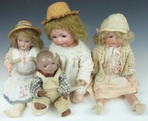 Four bisque headed dolls comprising two Heubach Koppelsdorf and two Simon Halbig, largest 46cm tall.