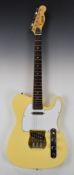 Eros Telecaster style electric guitar in ivory lacquered finish, in original hard case