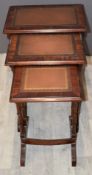 Nest of leather inset tables, W53 x D37 x H60cm