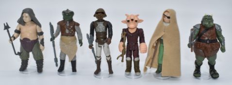 Six Kenner Star Wars figures including Gamorrean Guard, Rancor Keeper, Prune Face, Ree-Yees,