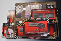 Carrera Evolution Scalextric style 'Le Mans' racing set together with 11 sets of track and an
