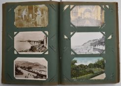 Over 300 postcards in an Edwardian album to include Gloucester and Cheltenham, Newnham street scene,