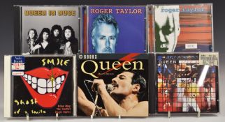 Queen - A collection of DVDs, CDs, VHS tapes and cassettes