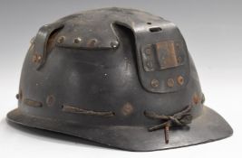 Vintage miner's or similar helmet with clip to front for light