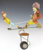 Cast metal figural balance toy with two pirates pulling a rope, 50cm tall.